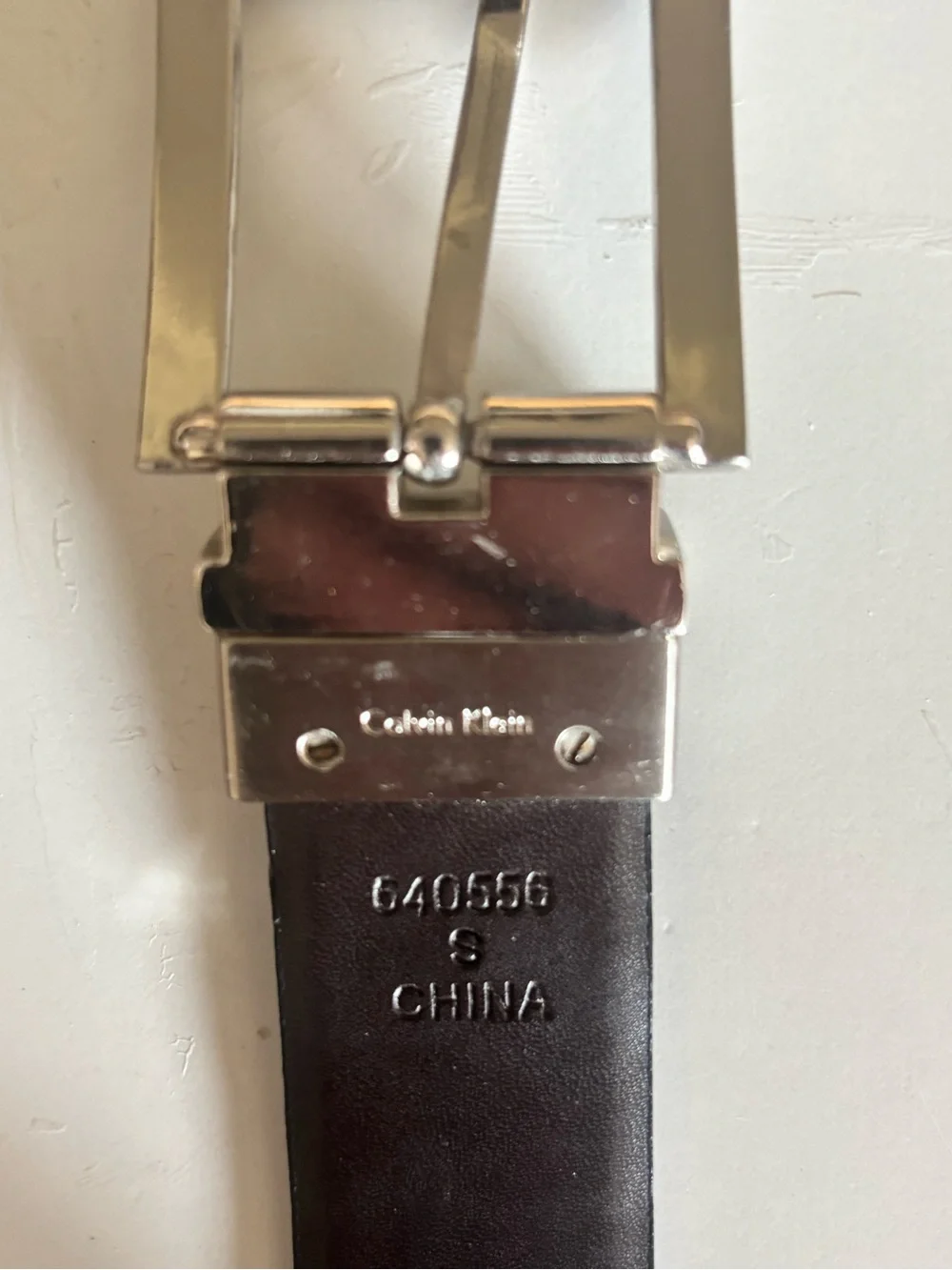 Calvin Klein reversible Polished Silver-Tone Buckle Black Leather Belt